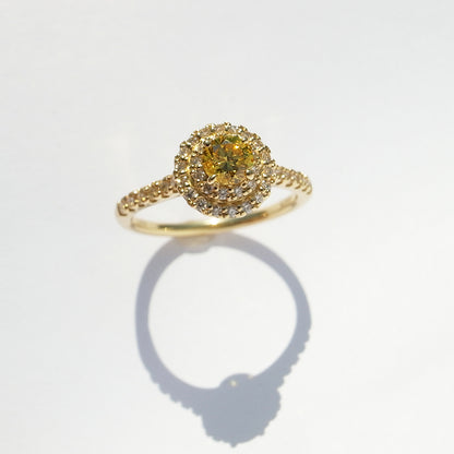 0.274ct natural color Fancy Vivid Yellow diamond ring in K18 yellow gold