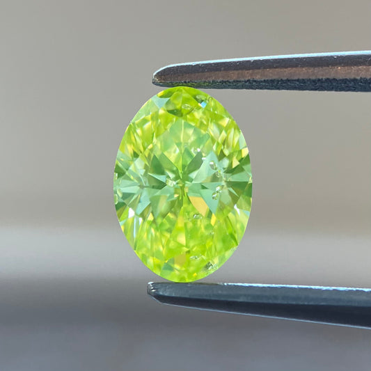 0.600ct natural color Fancy Intense Greenish Yellow oval loose diamond