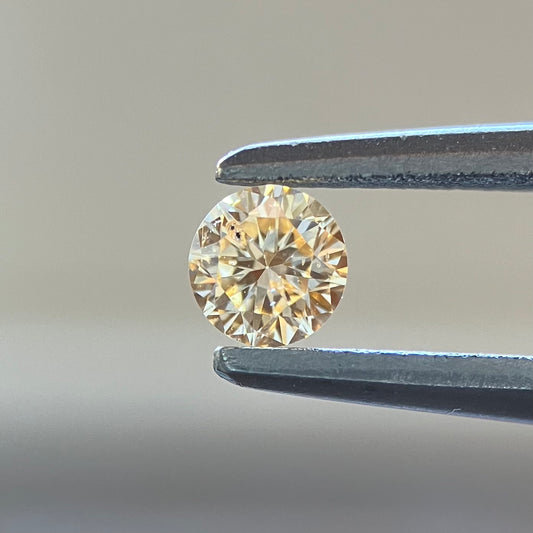 裸石 0.092ct Fancy Light Yellow Orange  SI-2 RD AGTソーティング付き