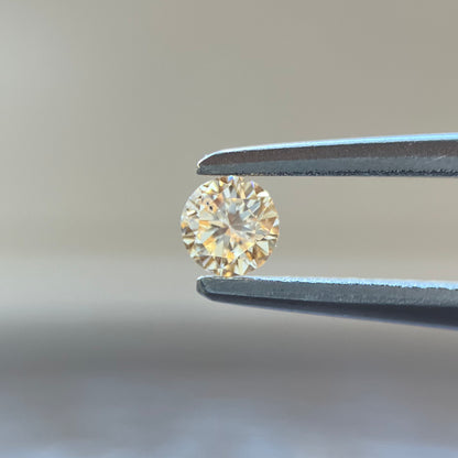 裸石 0.092ct Fancy Light Yellow Orange  SI-2 RD AGTソーティング付き