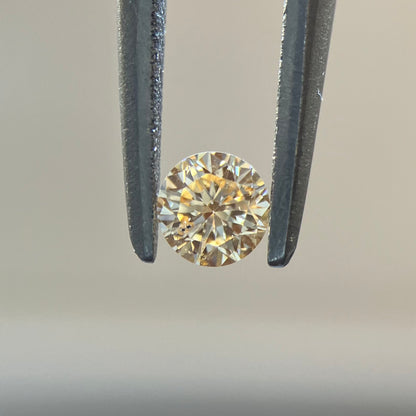 裸石 0.092ct Fancy Light Yellow Orange  SI-2 RD AGTソーティング付き