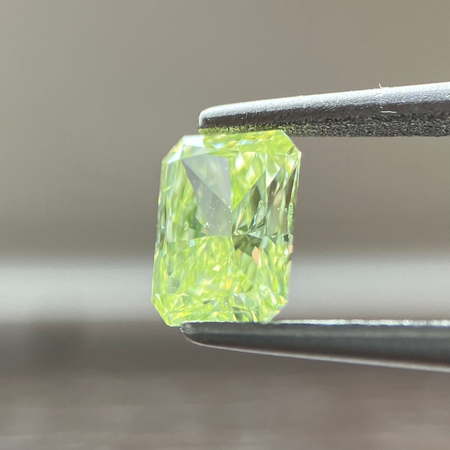 0.716ct Fancy Yellow Green Radiant Cut Loose Diamond with CGL Sorting Report