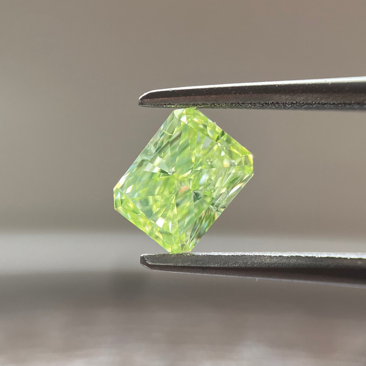 0.716ct Fancy Yellow Green Radiant Cut Loose Diamond with CGL Sorting Report