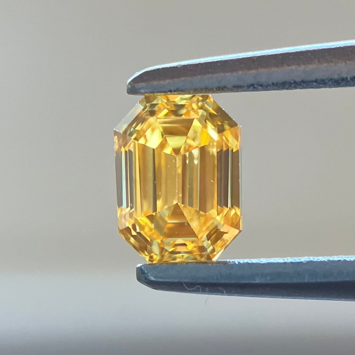 Loose diamond 0.337ct Fancy Vivid Orange Yellow SI-2 with Central Gem Laboratory sorting