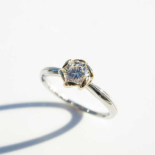 ダイヤモンドのK18YG・プラチナ花モチーフ婚約指輪